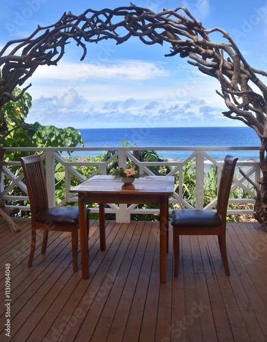 A tongan restaurant in traditional wooden design with a sea view over the Pacific Ocean photo