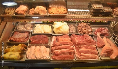 Local ahi tuna and meat poke bowls in a food market in Chinatown in Honolulu, Hawaii
