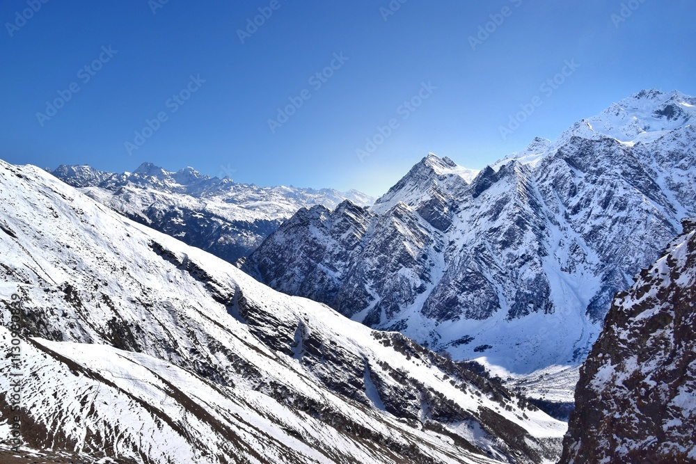 Obraz premium Snow-capped Himalayan mountain tops and glaciar peaks in Nepal