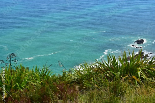 Sailing around Kgari Fraser Island and the turquoise blue ocean water in Australia photo