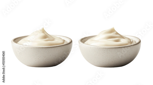 Twin ceramic bowls creamy spread minimalist presentation simplicity elegance culinary styling contrast white backdrop Isolated on white background or on a transparent background. photo