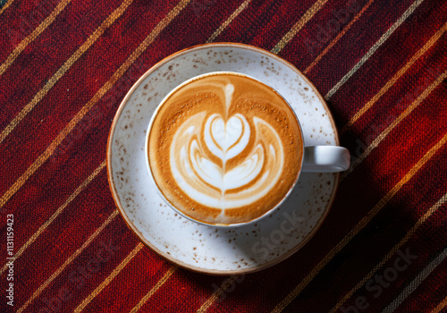 Warm Coffee On Rustic Fabric Table With Traditional Weave Patterns And Earthy Natural Textures photo