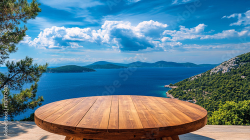 Wooden platform overlooking a large body of water. The view is serene and peaceful, with the water stretching out as far as the eye can see. The platform is surrounded by trees photo