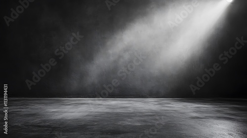 Dark room with spotlight and fog, concrete floor.