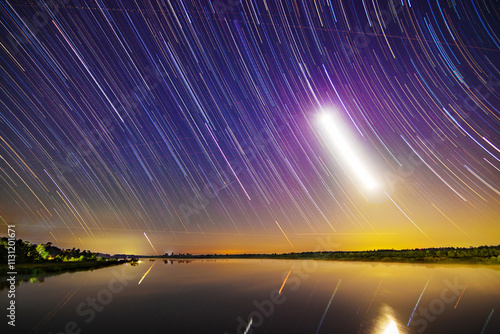 Star trails over the Satilla River in Woodbine, Georgia. photo