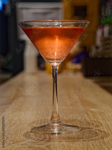 Cocktail glass cosmopolitan drink on bar