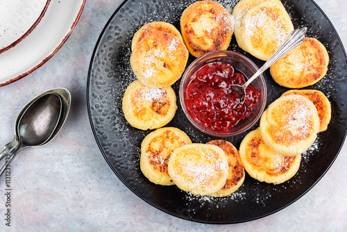 Cheese pancakes, syrniki. photo