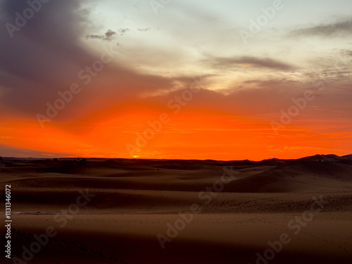 Sunset in the dunes of Chegaga in Morocco, Sahara desert photo