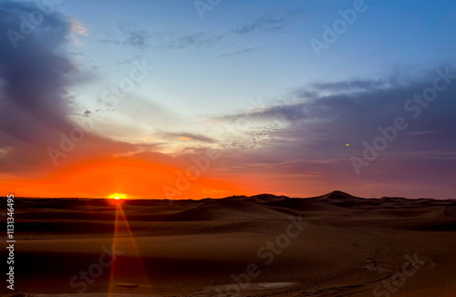 Sunset in the dunes of Chegaga in Morocco, Sahara desert photo