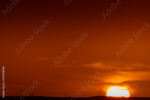 Sunset in the dunes of Chegaga in Morocco, Sahara desert photo