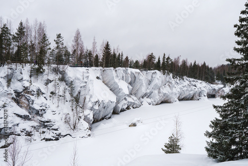 Wallpaper Mural Winter in the park. Karelia Ruskeala Nature Reserve in winter. It is snowing in the forest. Torontodigital.ca