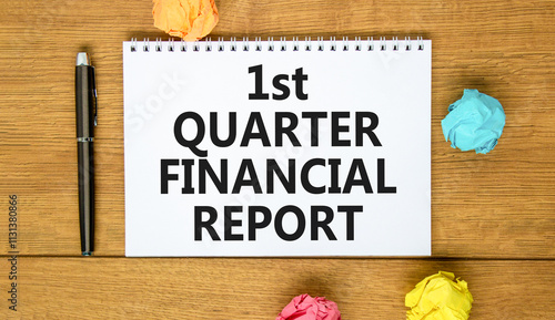 1st quarter financial report symbol. Concept words 1st quarter financial report on beautiful white note. Beautiful wooden background. Business 1st quarter financial report concept. Copy space. photo