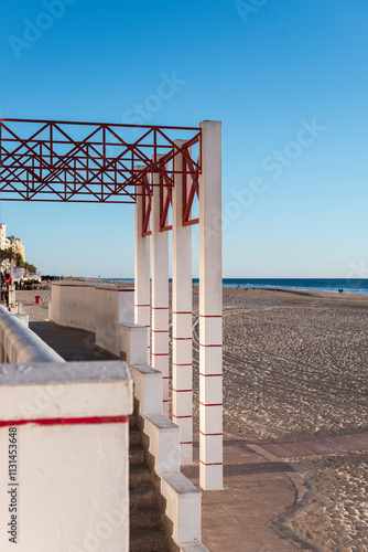 Coastal walkway with columns photo