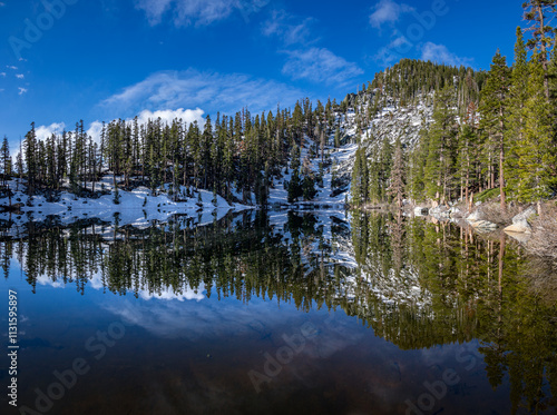 Obraz na płótnie Mirror image of trees in Granite Lake, California w salonie