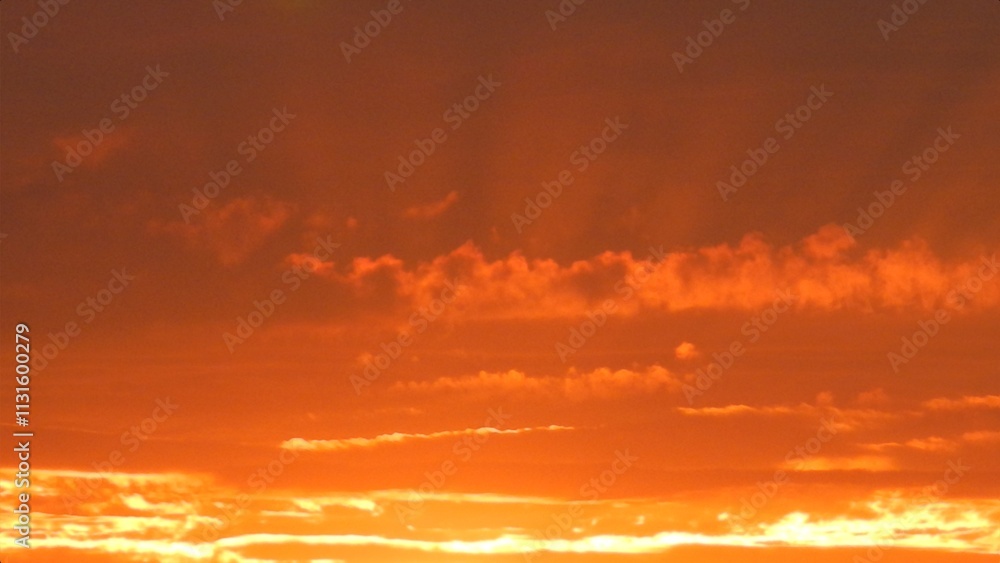 Obraz premium Abstract orange and yellow sky background with burning sky effect during sunset. Topics: hot colors, cloudy background, weather, meteorology, climate, air space, atmosphere, season, nature