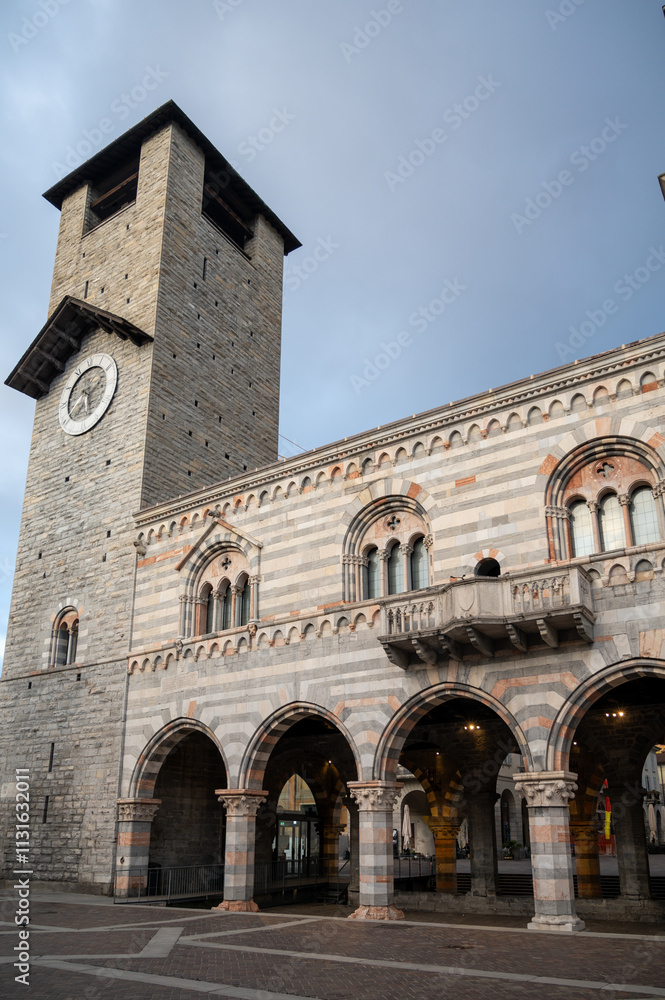 Obraz premium Tourist destination small medieval village of Como with hilly narrow streets and luxurious villas, holiday destination on Lake Como, Italy in spring