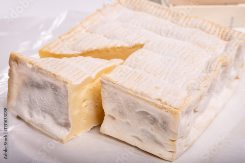 French squared pont l'eveque cow cheese from Calvados department, Normandy, France