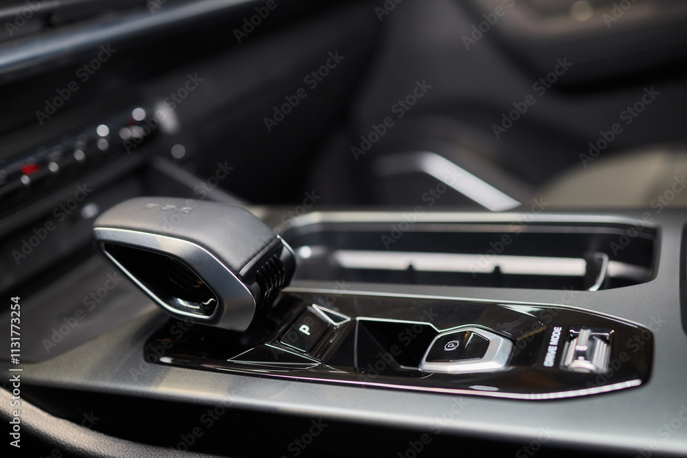 Naklejka premium Macro shot of a car gear lever an essential auto part