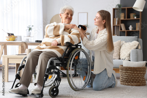 Happy senior woman in wheel...
