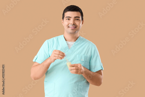 Male massage therapist with...