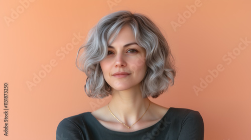 Minimal Portrait of a Grey-Haired Woman in Soft Peachy Pink, Modern Art Style photo