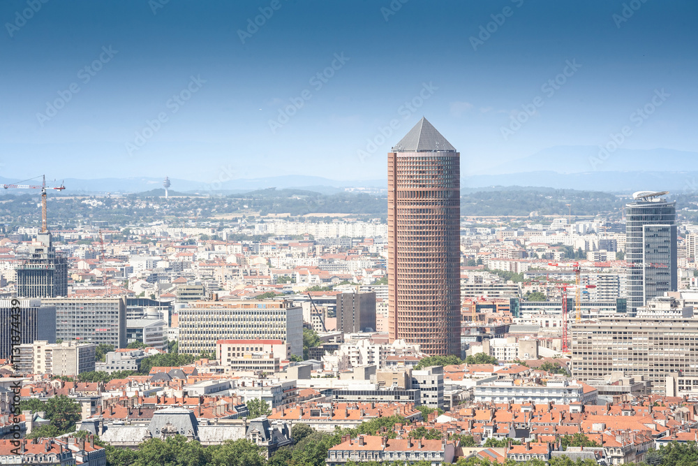 Naklejka premium Aerial panoramic view of Lyon with the skyline of Lyon skyscrapers visible in background during a sunny blue sky afternoon. Lyon is the second biggest city of france and a major economic hub.