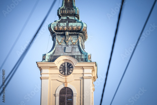 Selective blur on a small Serbian orthodox church with a austro hungarian architecture in the region of Banat, in Vojvodina, with a blue. Serbia is orthodox in Majority. photo