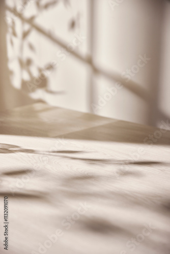 Wallpaper Mural Warm sunlight streaming in through the window, beige background, flowers, vases, and a table with plants. Harmony of light and shadow. Torontodigital.ca