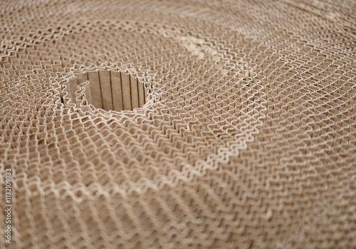 Art pattern from brown corrugated craft paper.