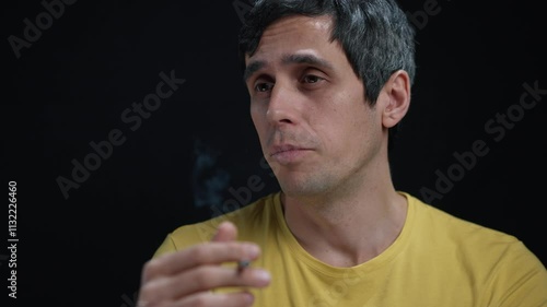 Man Smoking and Talking, Engaged in Philosophical Discussion