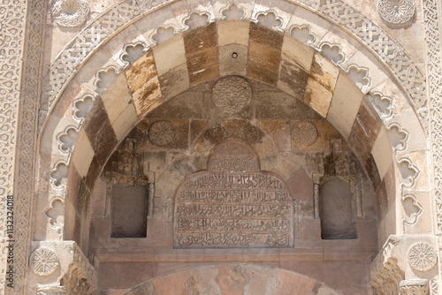 Konya - Turkey. Ornamental details of the Sircali Madrasah door. Islamic ornamental details on the historical monuments photo