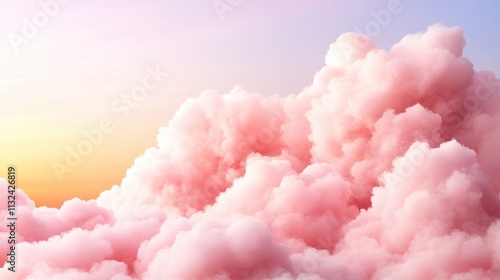 Airy pink clouds on the background of the sunset sky. Softness and romantic mood.