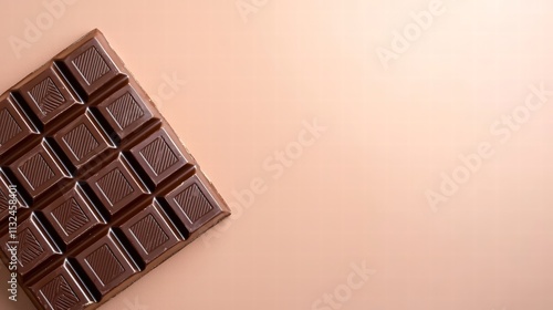 A stunning gourmet chocolate bar, elegantly wrapped and presented on a complimentary solid color background. The lighting technique emphasizes the texture of the packaging, ensuring that every detail