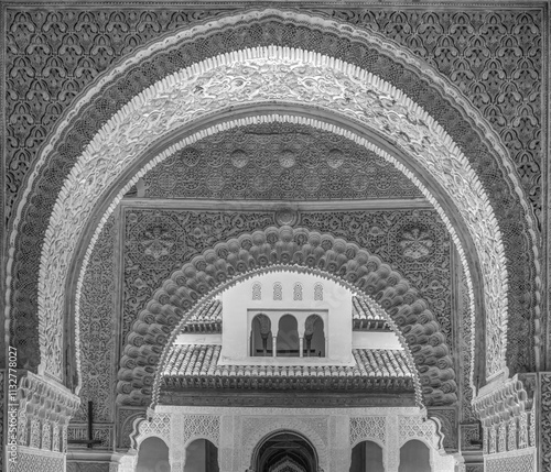 Detail of ornate decoration at the entrance to Patio de los Leones (Court Of The Lions), Alhambra, Granada, Andalusia, Spain