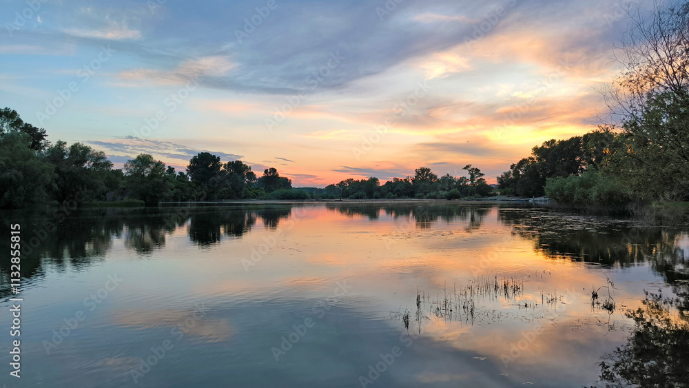 Naklejka premium sunset by the Danube river in Novi Sad