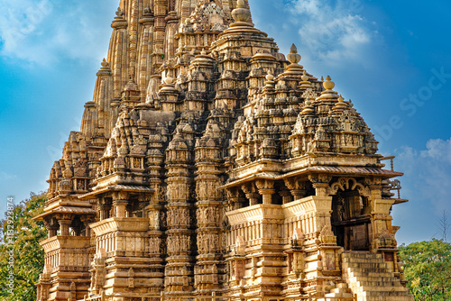 India. Madhya Pradesh state. The Khajuraho Group of Monuments are a group of Hindu and Jain temples. Kandariya Mahadev temple photo