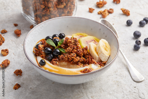 Granola with Dates, Berries, Banana and Almonds photo