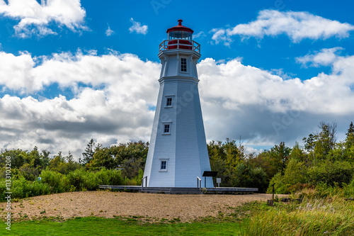 A view of the lighthouse by the Confederation bridge, Prince Edward Island, Canada in the fall