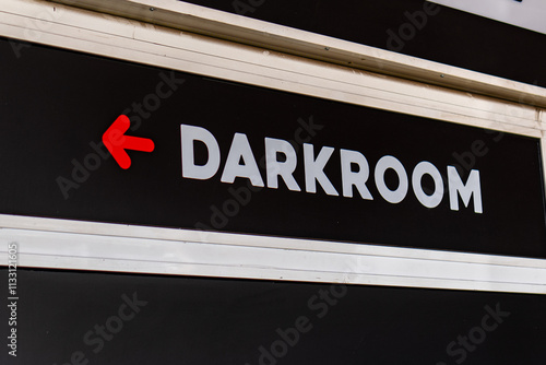 Fotografie Darkroom Sign with a red arrow to the left lgbtq community