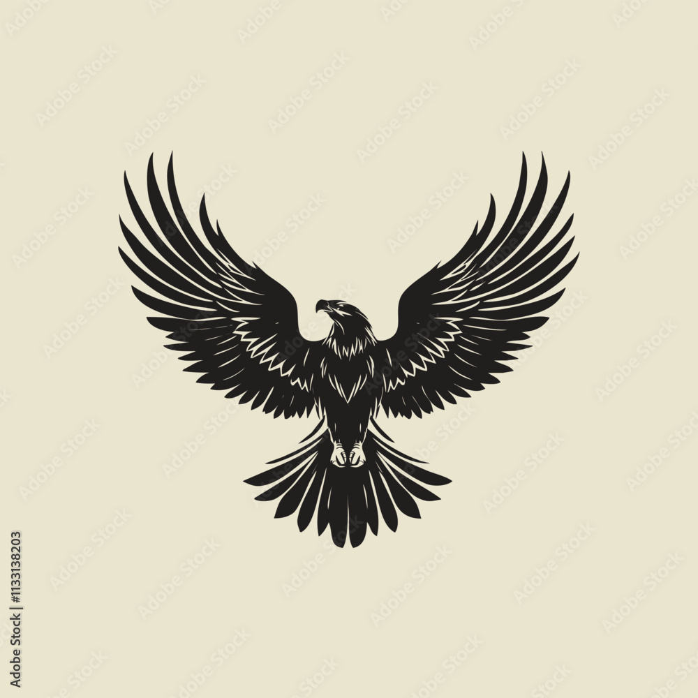 Obraz premium Silhouette of a soaring eagle with outstretched wings on a pure white background