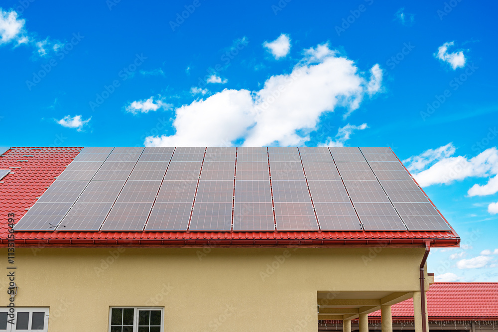 Solar panels on the roof of the house.