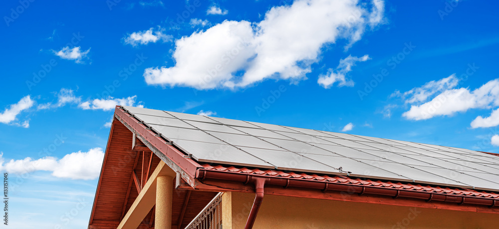 Solar panels on the roof of the house.