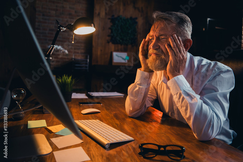 Photo of nice old man tired stressed deadline wear white shirt formalwear coworking evening light nice light office photo