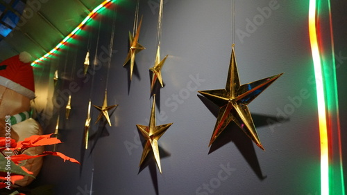 Golden Hanging Stars with Festive Lighting