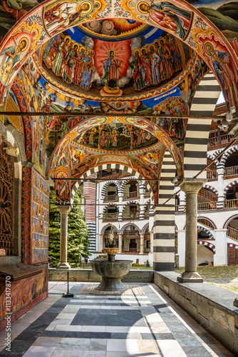 Religious frescoes painted on the main church wall and vaults in St. John of Rila monastery, Bulgaria.
