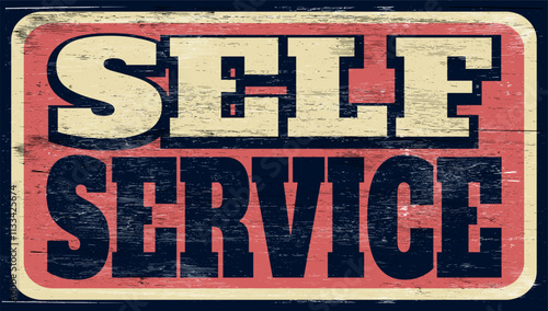 Aged vintage self service sign on wood
