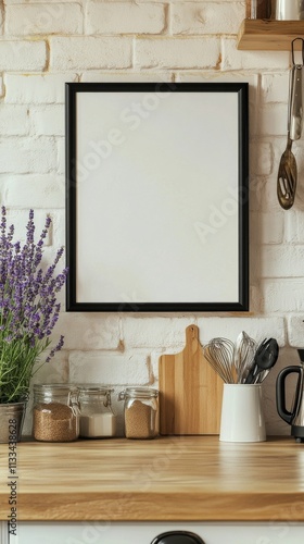 Decorative kitchen counter display with lavender, empty frame, and small tabl...