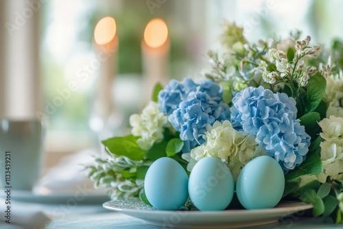 Elegant spring centerpiece featuring blue eggs and fresh flowers in a bowl