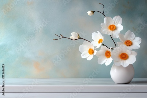 floral still life, carefully placed white chamomile flowers against a soft backdrop make a calming blend of visual harmony photo