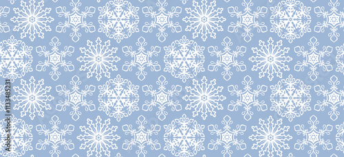 Snowflakes seamless pattern design. Graphic background with snow elements. Blue and white repetitive boho illustration. Winter wallpaper art.